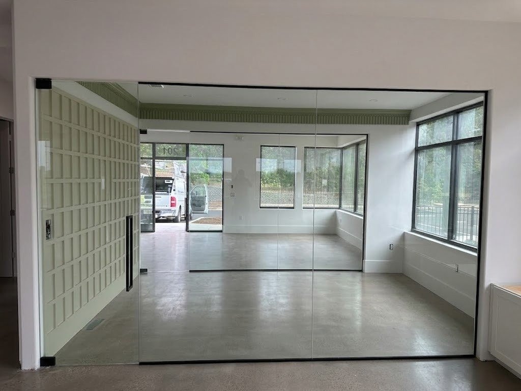 JD Glass Company team delivering glass installation services